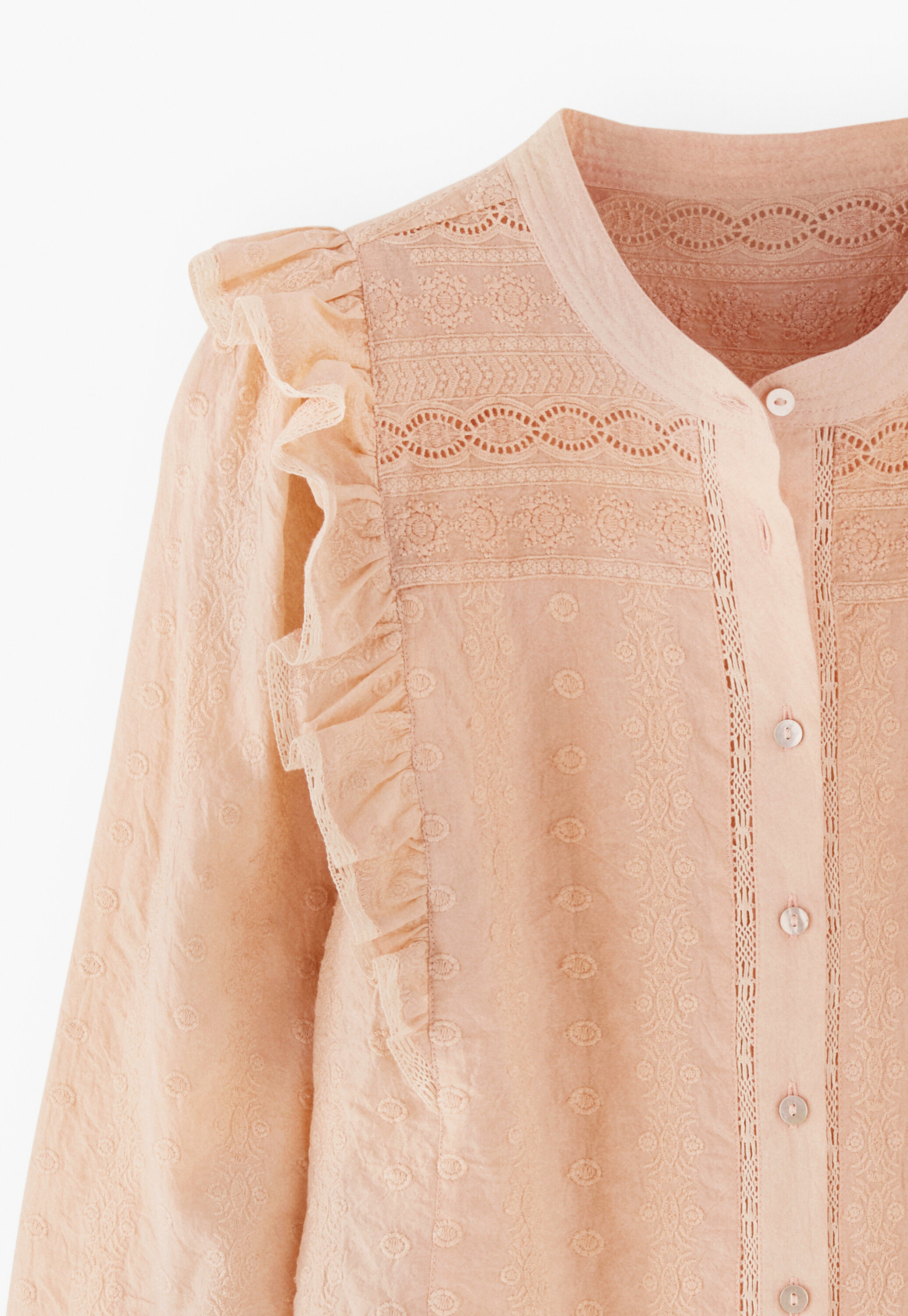 Broderie-Bluse